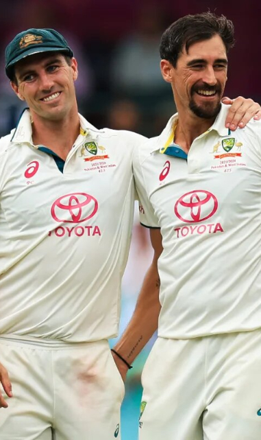 Hazlewood celebrates wicket with Cummins